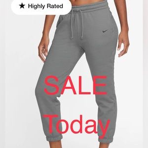 Nike Women’s Pants Therma Fit joggers Nike women’s pants dark gray pants size M
